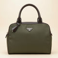 An olive green nylon messenger bag with dark brown leather trim and handles, featuring a silver-tone triangular Prada logo plaque on the front.