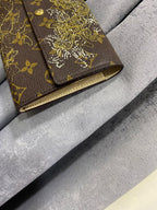 Louis Vuitton Monogram Dentelle Sarah Wallet Gold